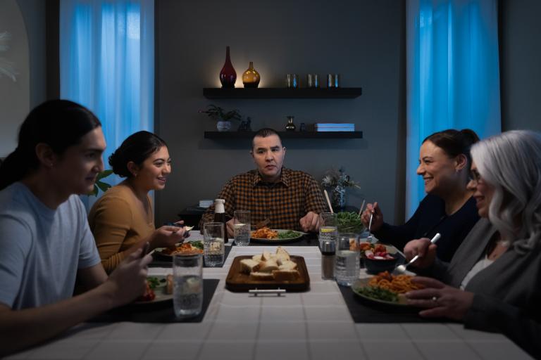 family sitting around kitchen table